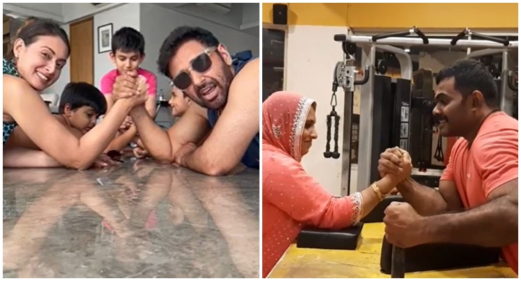  Intl. Family Day: Family battle at the arm wrestling table