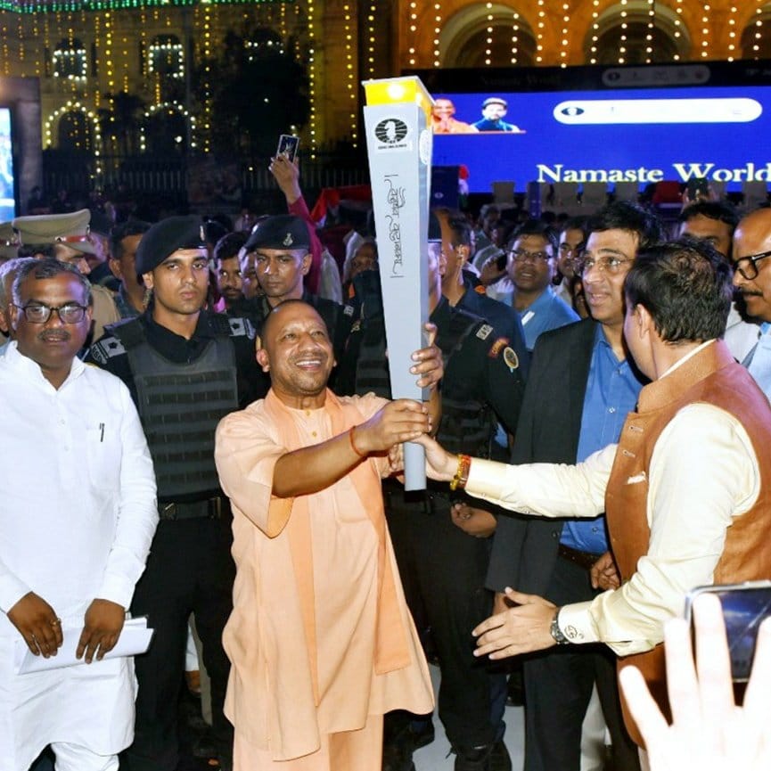 Yogi hands over Chess Olympiad torch to Viswanathan Anand