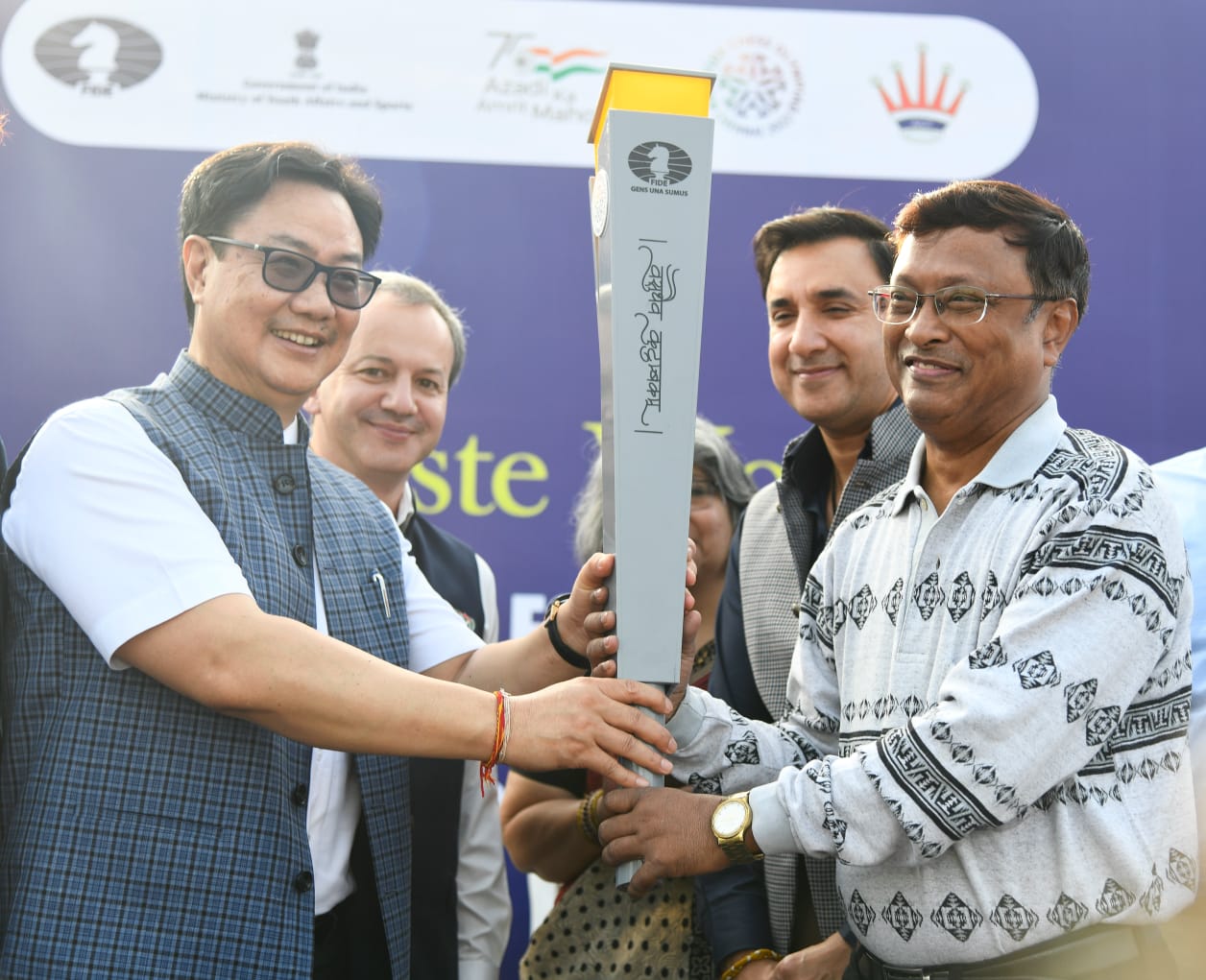 Yogi hands over Chess Olympiad torch to Viswanathan Anand